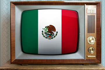 old tube vintage TV with the national flag of mexico on the screen, the concept of eternal values ​​on television, global world trade, politics, retro technology, news