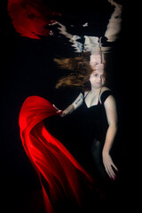 red dancer underwater