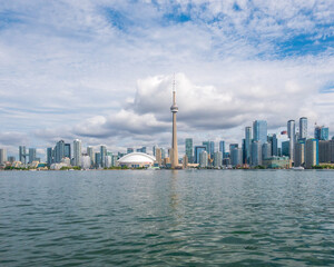 Storm clouds over the city of Toronto and the CN Tower seen from the Toronto Islands.
