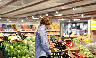 Man buying fruits and vegetables  at the market