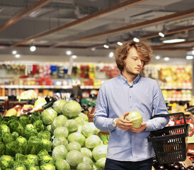 Man buying fruits and vegetables  at the market