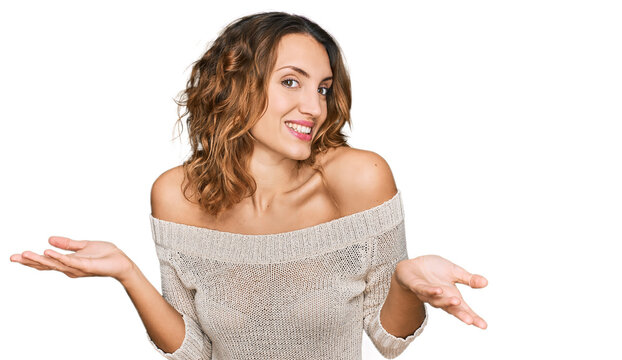Beautiful young caucasian woman wearing casual clothes clueless and confused expression with arms and hands raised. doubt concept.