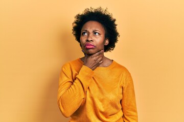 Young african american woman wearing casual clothes touching painful neck, sore throat for flu, clod and infection