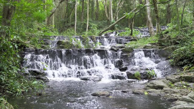 Beautiful stream and waterfall in tropical forest at Namtok Samlan National Park, Saraburi, Thailand