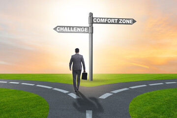 Businessman choosing between leaving comfort zone or not
