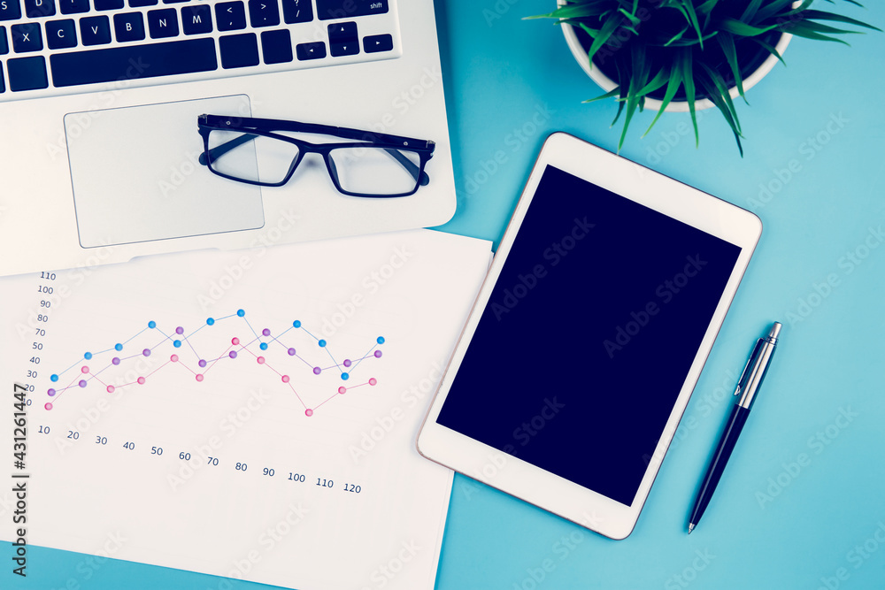 Poster laptop computer and documents report statistic financial with graph and chart and glasses and tablet