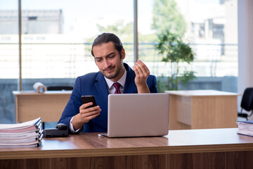 Young businessman employee working in the office