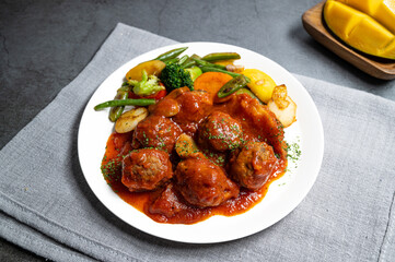 delicious meat balls with vegetables