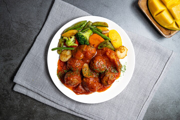 delicious meat balls with vegetables