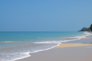 Beautiful beach and blue sky on a sunny day. Background for summer vacation.