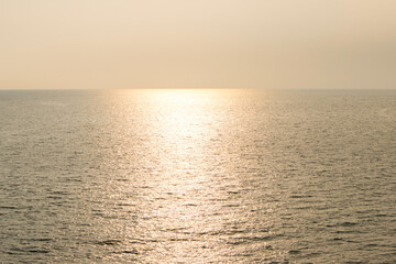 Beautiful scene, Sea with golden dramatic sky in sunset.