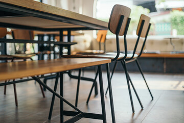 Close up indoor wooden cafe furniture 