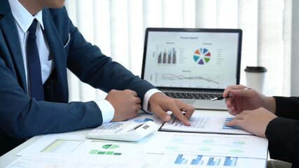 Business concept a male startup entrepreneur presenting business data to an investor for the business expansion.