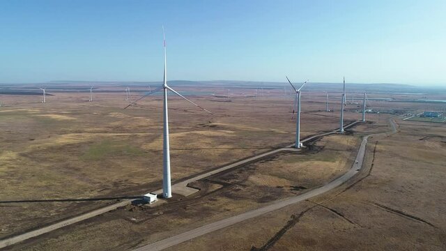 Flying over a wind farm on a clear day