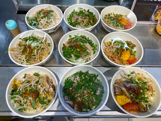 Delicious Pho bowl and noodle soup in food court in Vietnam