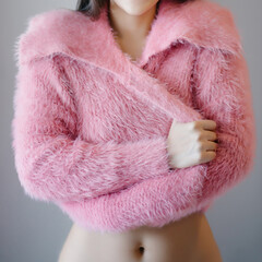 A sexy girl wearing a pink fur coat