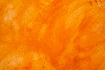 Textured wall brushed painted Background, Abstract Orange Oil Color.