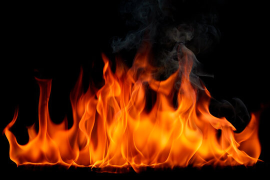 A burning flame And smoke on a black background