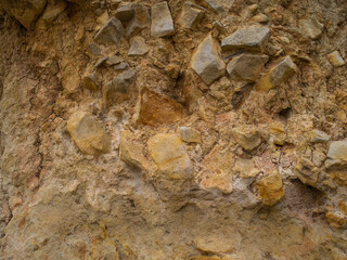 Orange stone rock, stone, textured. Background for design. Soft light.