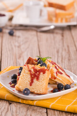 Lemon cake with blueberries and mint.