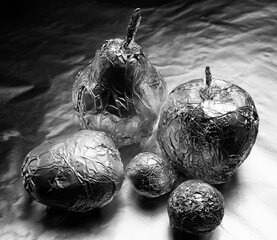 some fruits covered with aluminum foil