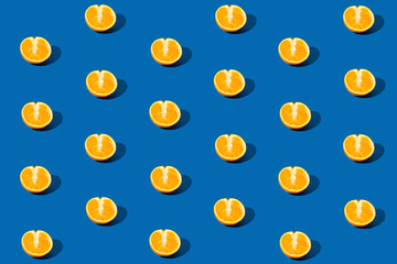 Orange fruit pattern on blue background.
