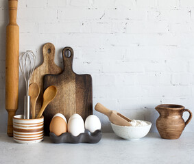 Utensils and baking ingredients. Kitchen interior