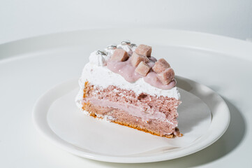 slice of taro cake on white table 