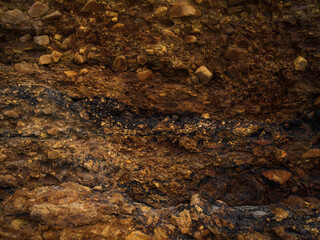 Orange stone, textured stone. Background for design. Soft light.