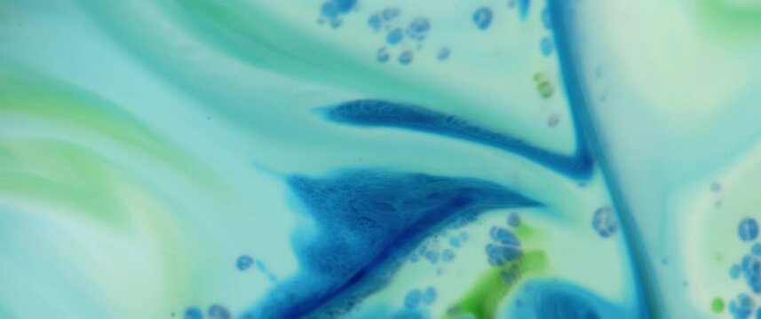Macro Textures with Vibrant Neon Color Palette. Abstract Background Made with Oil Mixed with Royal Blue and Teal Dye, Ink, and Paint.