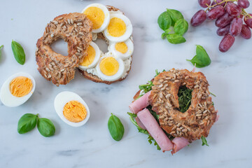 freshly baked whole grain bagels. heap of fresh baked bagels