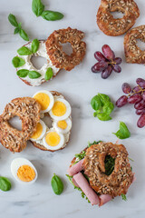 freshly baked whole grain bagels. heap of fresh baked bagels