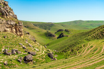 Green hills and cliffs in spring