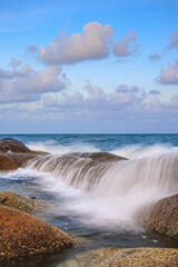 waves crashing on rocks