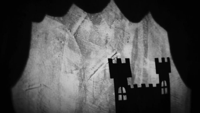Vintage animation, shadow theatre on a wall. Pantomime, fantasy story. Halloween scene, black and white storytelling. Classic fable for children, creepy puppets.