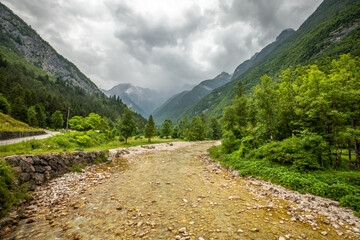 Naklejka na ściany i meble Vivid turquoise Soca river valley near Bovec in Triglav National Park, Julian Alps, Slovenia, Europe.