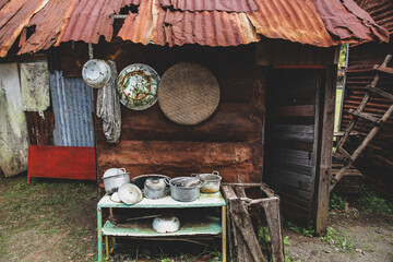 Old little shack with cooking equipment
