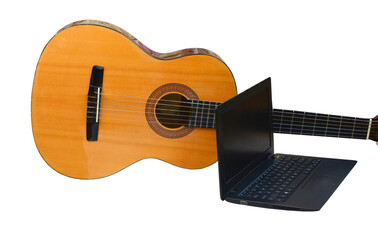 Obraz premium guitar and laptop isolated on a white background, the concept of music courses online