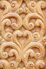 Background wooden texture with carving patterns brown wall
