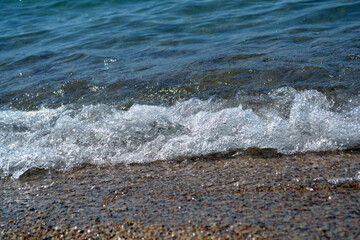 Black Sea coast. Black Sea. Sea wave and sand

