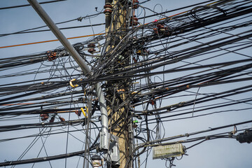 tangled electrical wires. Power lines in poor condition