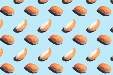 Hard light pattern of one nigiri-sushi photographed in variations on light blue background