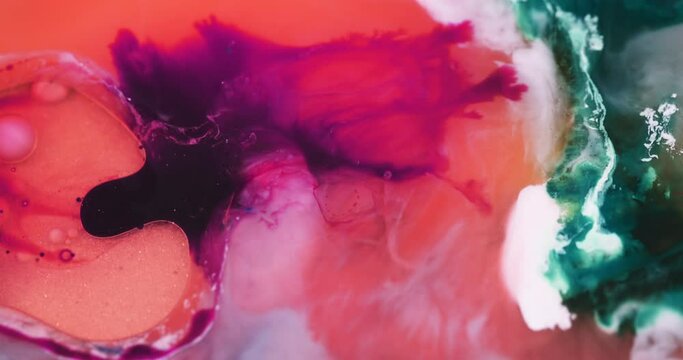 Macro Textures with Vibrant Neon Color Palette. Abstract Background Made with Oil Mixed with Red and Pink Dye, Ink, and Paint.