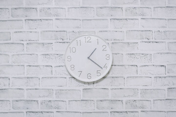 Clock wall hanging brick background