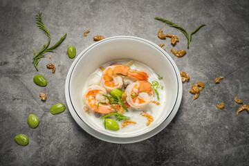 Shrimp with coconut milk and young coconut shoots