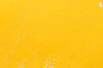 The texture of old paint on metal with scratches and roughness. Trendy yellow paint background.