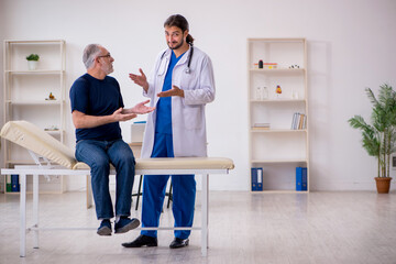 Old male patient visiting young male doctor