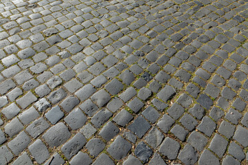Fototapeta premium harmonic pattern of old cobble stone way