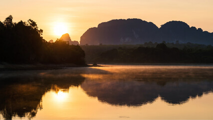 Sunrise at Nong Thale lake with mist, Krabi