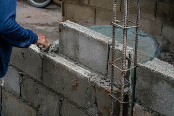 Cement concrete poll in construction site wall building